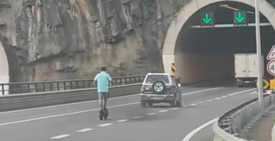 Homem decide andar de trotinete na via rápida
